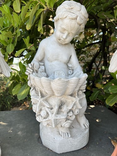 Fontana cherubino conchiglia